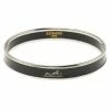 Hermes Caleche Black Enamel Gold Tone Narrow Bracelet For Women