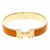 Hermes Clic Clac H Orange Enamel Gold-Plated Narrow Bracelet PM For Women -Deals Hermes Store luxury women hermes used accessories p102255 001