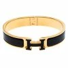 Hermes Clic Clac H Black Enamel Gold Plated Narrow Bracelet GM For Women -Deals Hermes Store luxury women hermes used accessories p253911 002