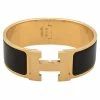 Hermes Clic Clac H Black Enamel Gold Plated Bracelet PM For Women 1 Hermes Clic Clac H Black Enamel Gold Plated Bracelet PM For Women -Deals Hermes Store luxury women hermes used accessories p340107 001