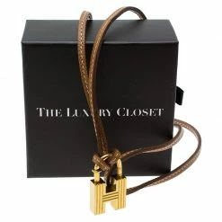 Hermes 2000 "Premiers Pas Dans Le Siècle" Cadena Charm Padlock For Women 9 Hermes 2000 "Premiers Pas Dans Le Siècle" Cadena Charm Padlock For Women -Deals Hermes Store luxury women hermes used accessories p53512 004