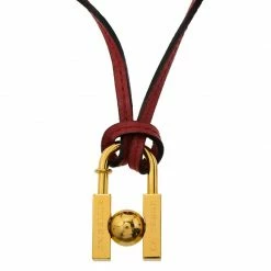 Hermes Hermès 2001 L'Homme Peut Embellir La Terre Padlock Gold Tone Pendant Necklace For Women