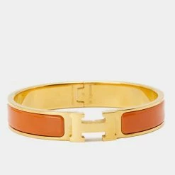 Hermes Clic H Orange Enamel Gold Tone Metal Bracelet For Women