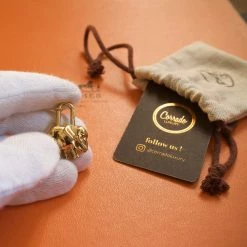 Hermes Gold Elephant Cadena Lock Charm For Women -Deals Hermes Store luxury women hermes used accessories p667762 001