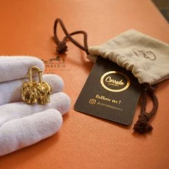 Hermes Gold Elephant Cadena Lock Charm For Women -Deals Hermes Store luxury women hermes used accessories p667762 002
