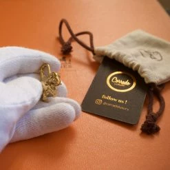 Hermes Gold Elephant Cadena Lock Charm For Women -Deals Hermes Store luxury women hermes used accessories p667762 005