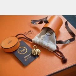 Hermes Gold Elephant Cadena Lock Charm For Women -Deals Hermes Store luxury women hermes used accessories p667762 006
