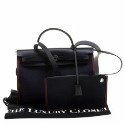 Hermes Black/Navy Blue Leather And Canvas Herbag Zip 31 Bag For Women -Deals Hermes Store luxury women hermes used handbags p131400 009