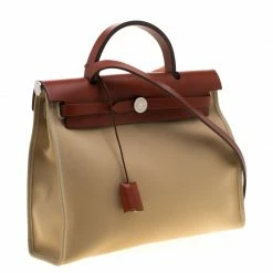 Hermes Trench/Copper Canvas And Leather Herbag Zip 31 Bag For Women 16 Hermes Trench/Copper Canvas And Leather Herbag Zip 31 Bag For Women -Deals Hermes Store luxury women hermes used handbags p186266 008