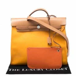 Hermes Jeune D'Or Canvas And Leather Herbag Zip 39 Bag For Women 23 Hermes Jeune D'Or Canvas And Leather Herbag Zip 39 Bag For Women -Deals Hermes Store luxury women hermes used handbags p268235 003