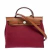 Hermes Red Canvas And Leather Herbag Zip 31 Bag For Women 1 Hermes Red Canvas And Leather Herbag Zip 31 Bag For Women -Deals Hermes Store luxury women hermes used handbags p325781 006