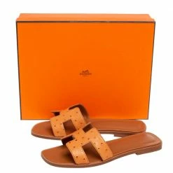 Hermes Brown Ostrich Leather Oran Flat Slides Size 37.5 For Women -Deals Hermes Store luxury women hermes used shoes p607044 001